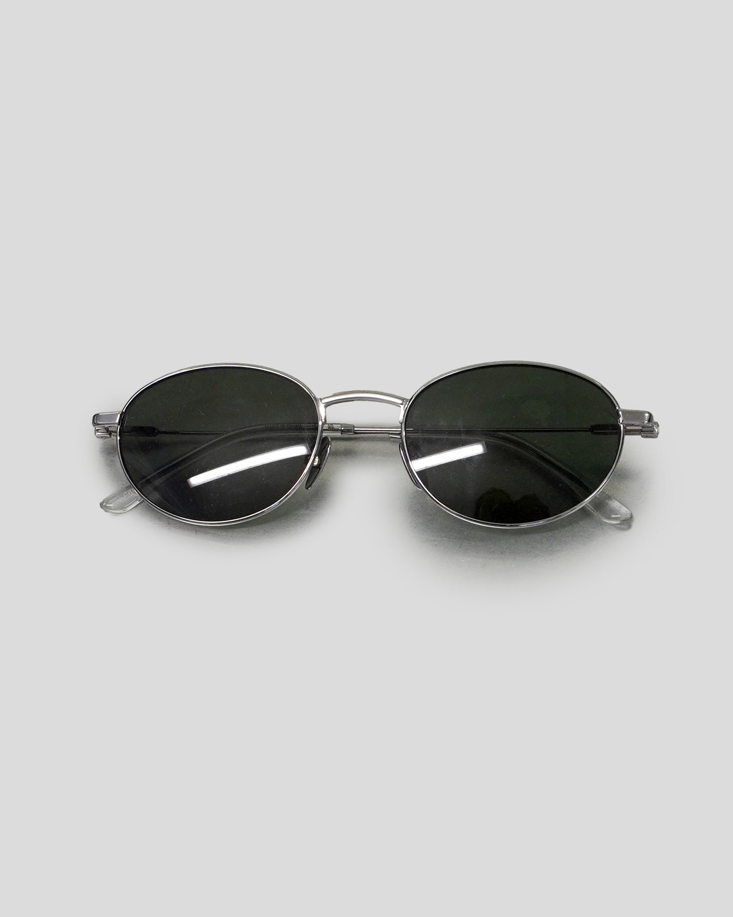 The Cruz with Silver Frame & Green Lens